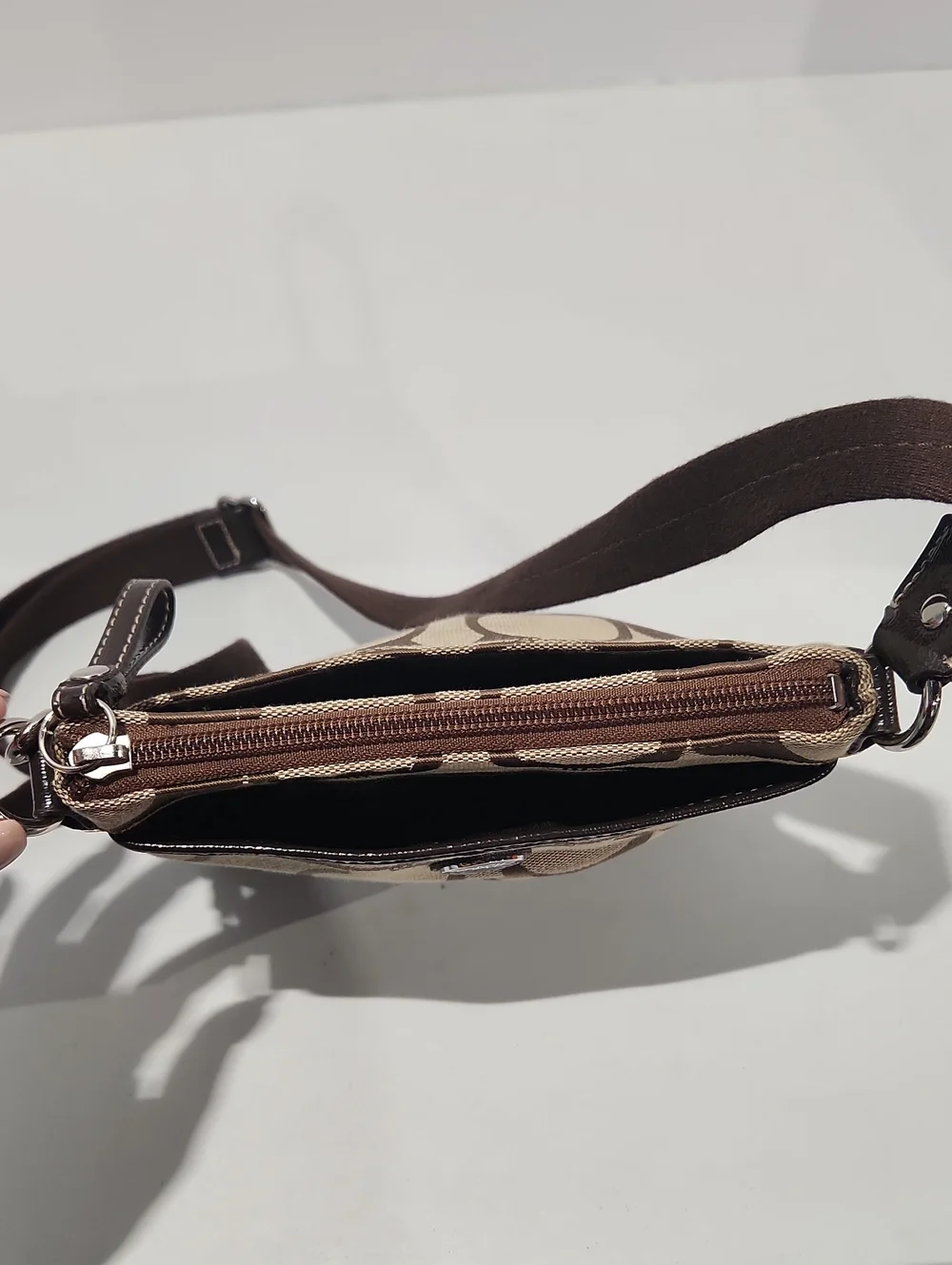 Coach Signature Print Stripe Swing Pack Crossbody Bag Khaki Tan
